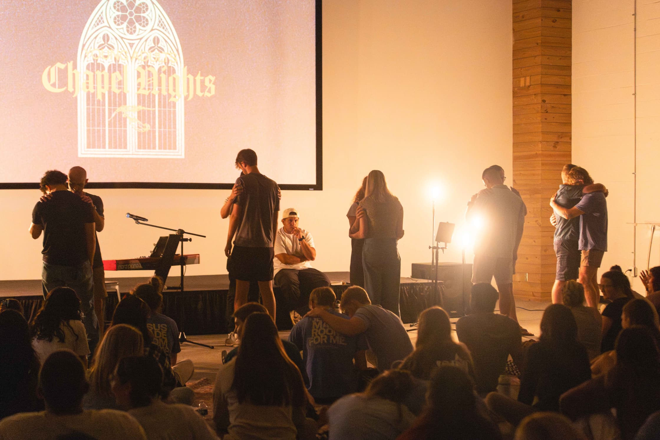 Photo of young adults chapel night